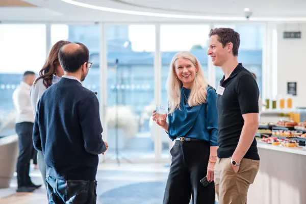 Guests in conversation during the event at Goodwin — Management Incentives in the AI Era