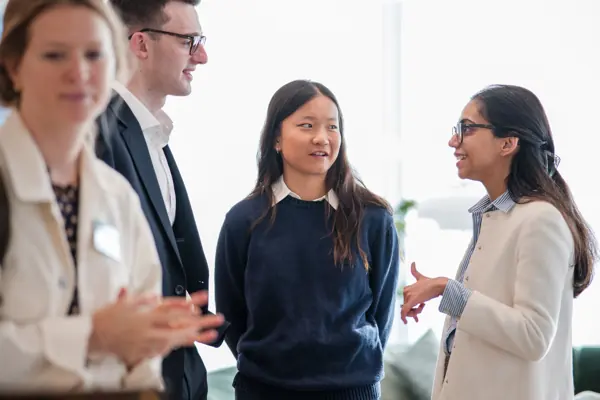 Guests in conversation during the event at Goodwin — Management Incentives in the AI Era