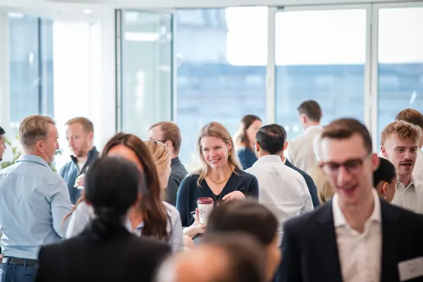 Guests in conversation during the event at Goodwin — Management Incentives in the AI Era