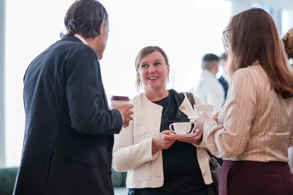 Guests in conversation during the event at Goodwin — Management Incentives in the AI Era