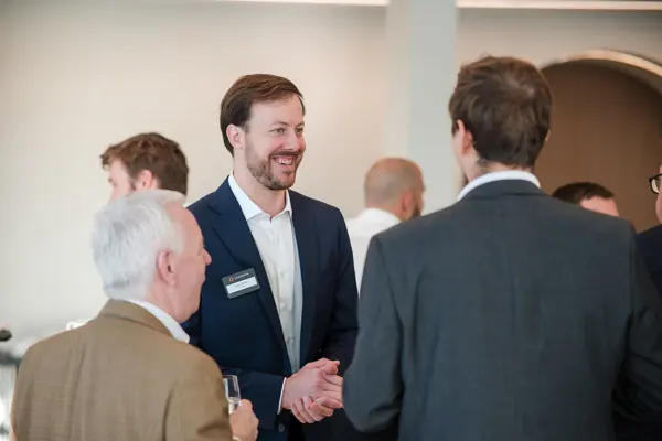 Guests in conversation during the event at Goodwin — Management Incentives in the AI Era