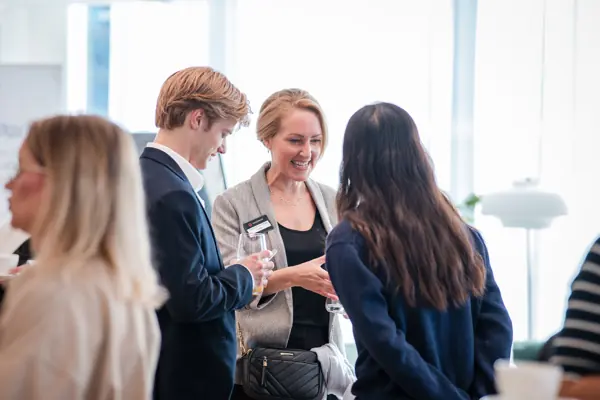 Guests in conversation during the event at Goodwin — Management Incentives in the AI Era