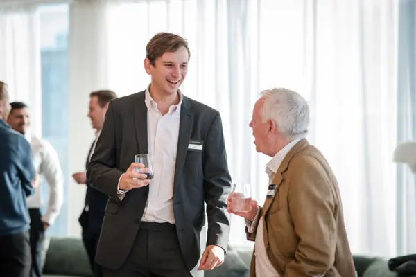 Guests in conversation during the event at Goodwin — Management Incentives in the AI Era