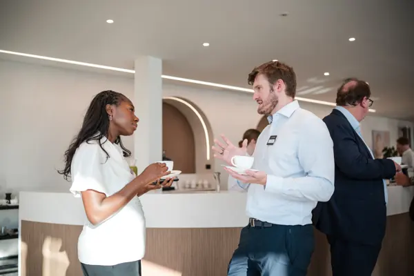 Guests in conversation during the event at Goodwin — Management Incentives in the AI Era