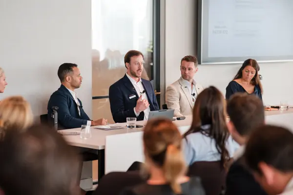 Speakers taking part in a panel discussion at Goodwin — Management Incentives in the AI Era