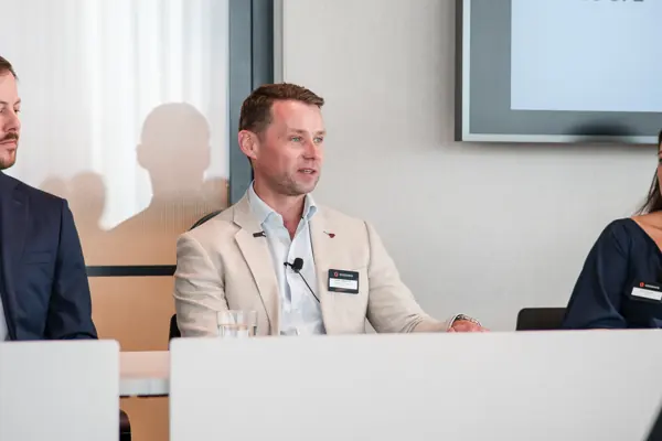 A panel guest responding during the discussion at Goodwin — Management Incentives in the AI Era