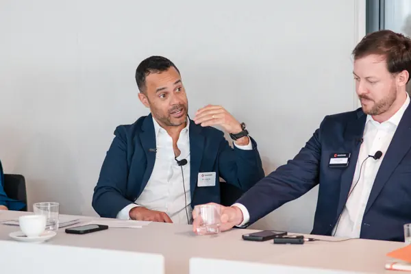 A speaker addressing attendees during a session at Goodwin — Management Incentives in the AI Era