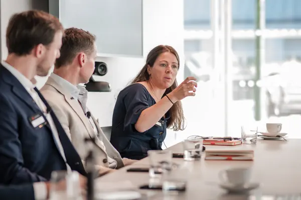 A speaker addressing attendees during a session at Goodwin — Management Incentives in the AI Era