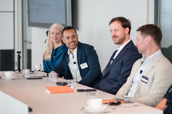 Speakers taking part in a panel discussion at Goodwin — Management Incentives in the AI Era