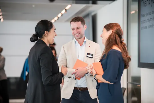 Guests in conversation during the event at Goodwin — Management Incentives in the AI Era
