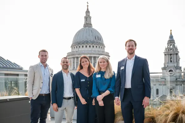 The event group pictured with St Paul’s Cathedral in the background at Goodwin — Management Incentives in the AI Era