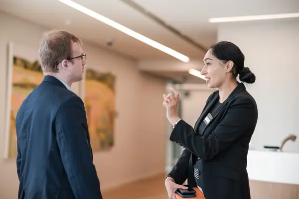 Guests in conversation during the event at Goodwin — Management Incentives in the AI Era