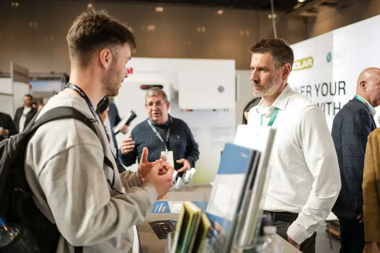 A conversation at the Fáilte Solar stand at Fáilte Solar at Solar & Storage