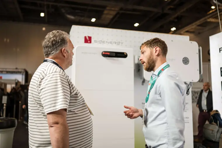 Visitors exploring the featured technology at Fáilte Solar at Solar & Storage