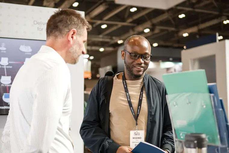 Visitors and exhibitors in conversation at Fáilte Solar at Solar & Storage