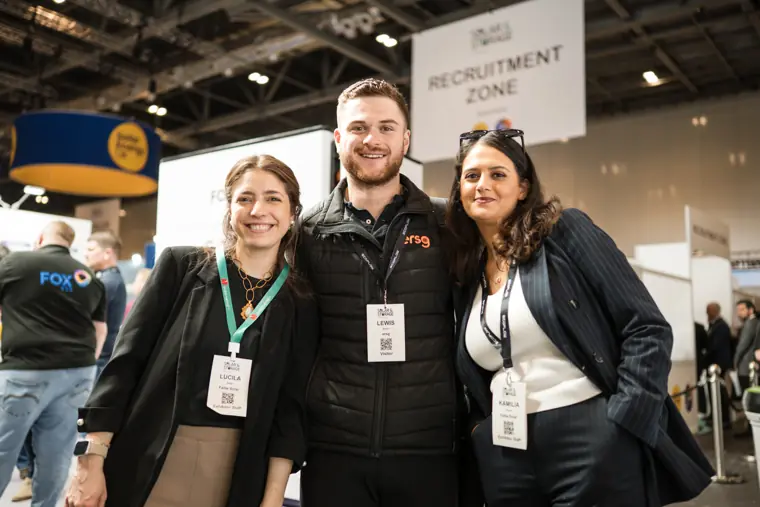 Three guests pictured together at the exhibition at Fáilte Solar at Solar & Storage