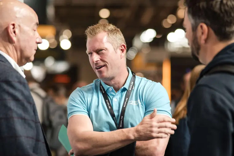 Visitors and exhibitors in conversation at Fáilte Solar at Solar & Storage