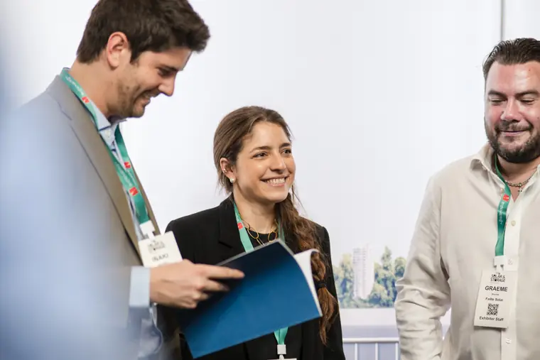 The team discussing product information with visitors at Fáilte Solar at Solar & Storage