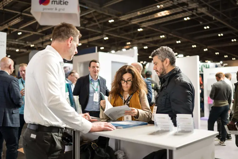 Visitors and exhibitors in conversation at Fáilte Solar at Solar & Storage