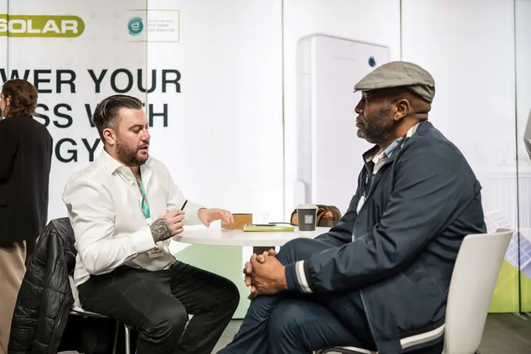 A seated interview at the exhibition at Fáilte Solar at Solar & Storage
