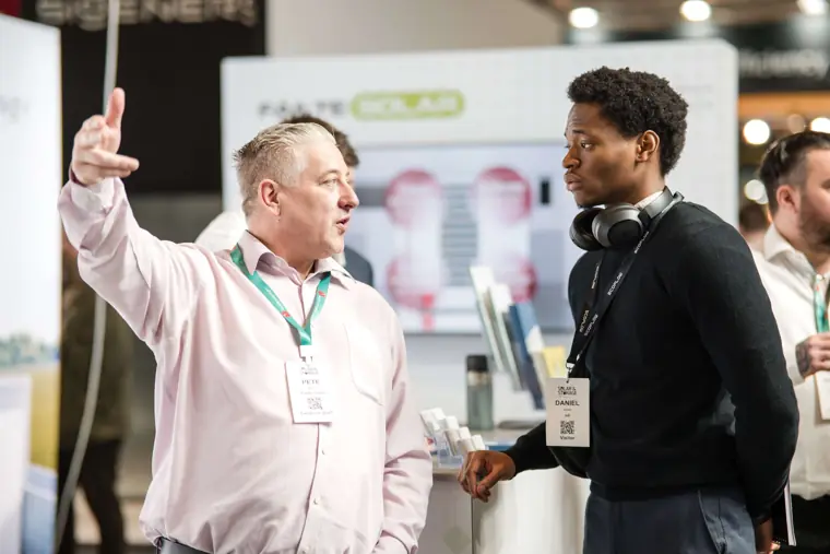 An animated conversation at the stand at Fáilte Solar at Solar & Storage