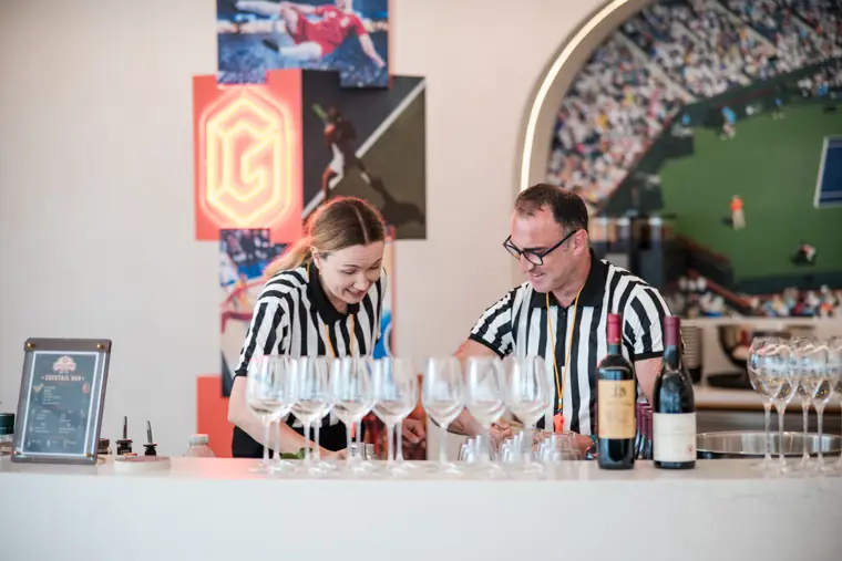 The bar team preparing drinks for arriving guests at Goodwin Tavern.