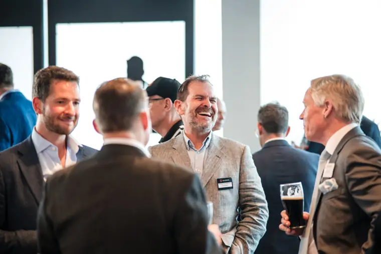 Guests chatting with the Goodwin team at Goodwin Tavern.