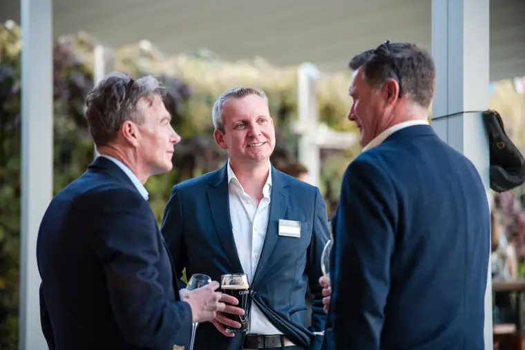 A candid conversation on the terrace at Goodwin Tavern.