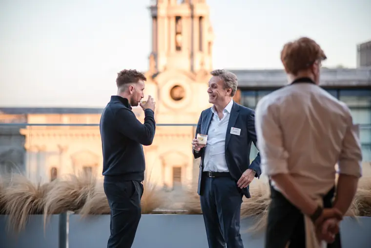 A conversation on the terrace with St Paul’s behind at Goodwin Tavern.