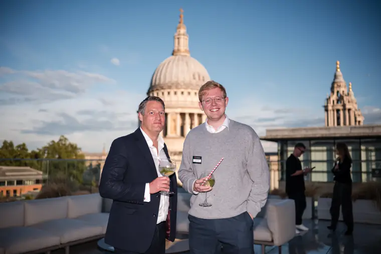 Guests posing on the terrace with St Paul’s behind at Goodwin Tavern.