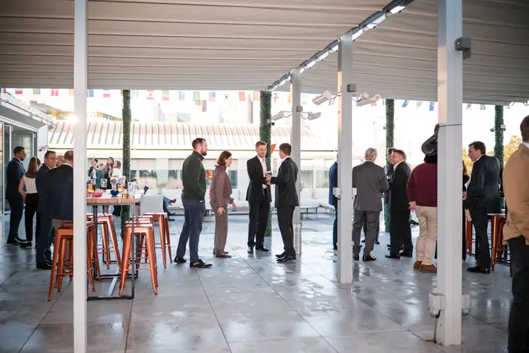 A wide view across the populated outdoor terrace at Goodwin Tavern.