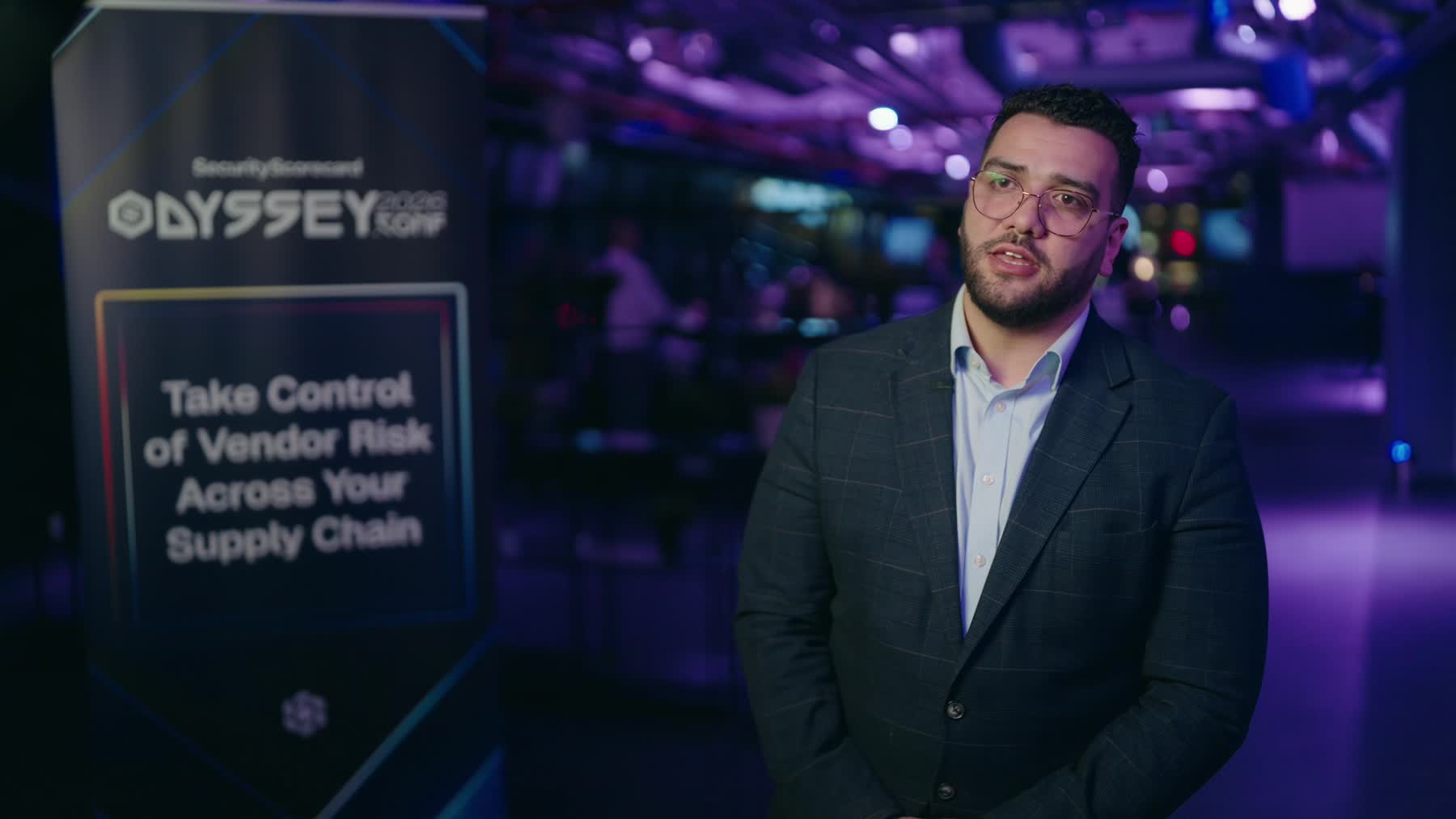 Video still: interview with branded Odyssey event backdrop · SecurityScorecard