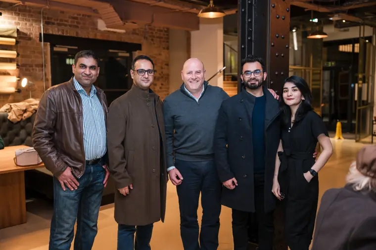 Group portrait of guests and hosts.