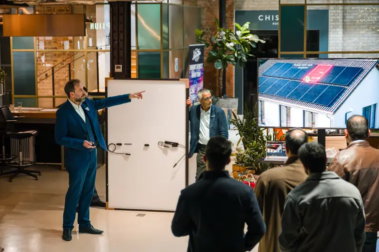 Product presentation beside a solar display.