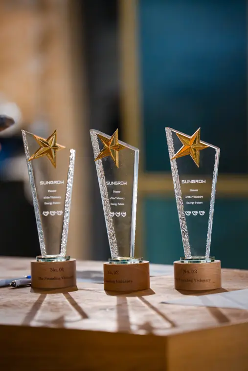 Awards arranged on a table at the venue.
