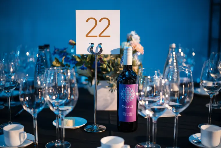 A place setting and flowers ready for guests.
