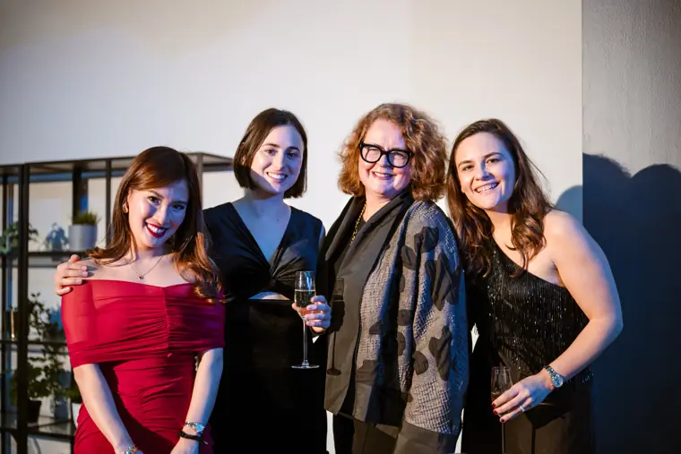 Guests posing for a group photograph.