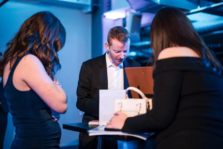 Guests at a display during the awards evening.