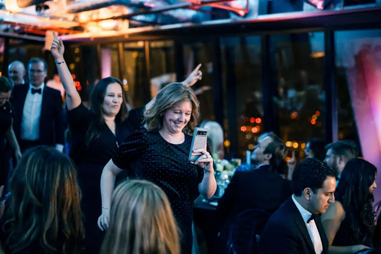 Guests celebrating on the dance floor.