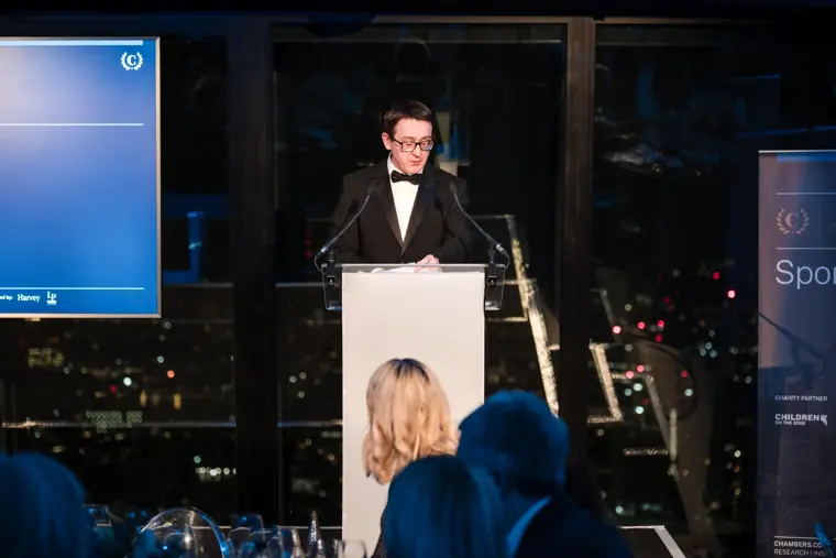 A speaker at the lectern late in the ceremony.