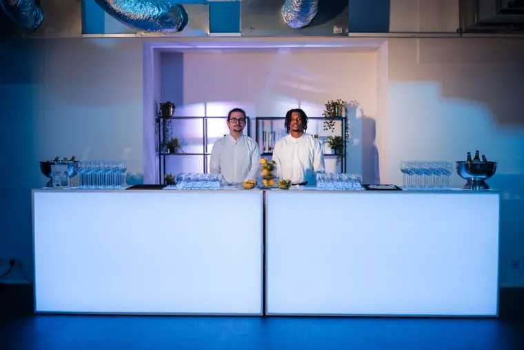 Bar staff ready to serve guests.