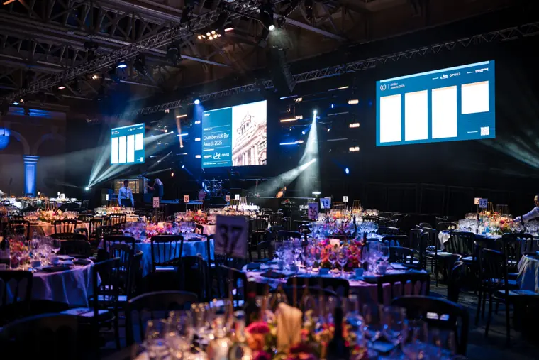 The awards hall ready for guests beneath the stage screens.