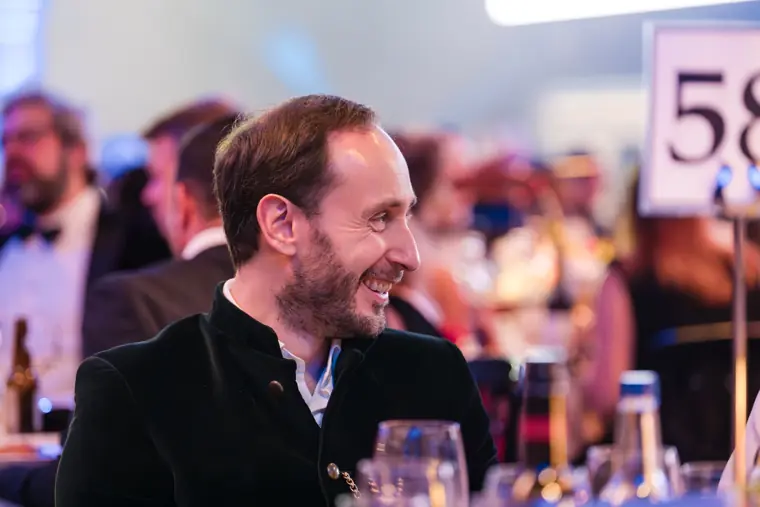 Guests chatting across the awards dinner.