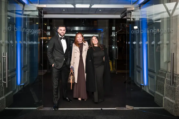 Three guests entering Old Billingsgate.