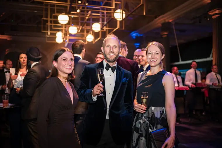 Guests posing together at the reception.