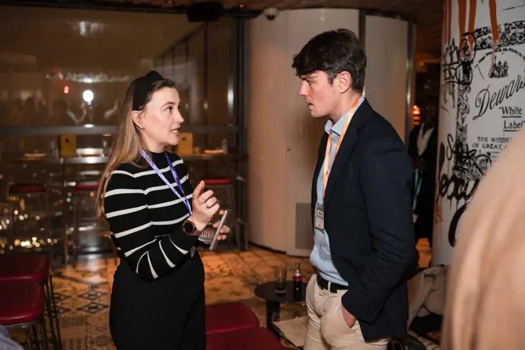 Guests connecting at the ClickUp evening reception.
