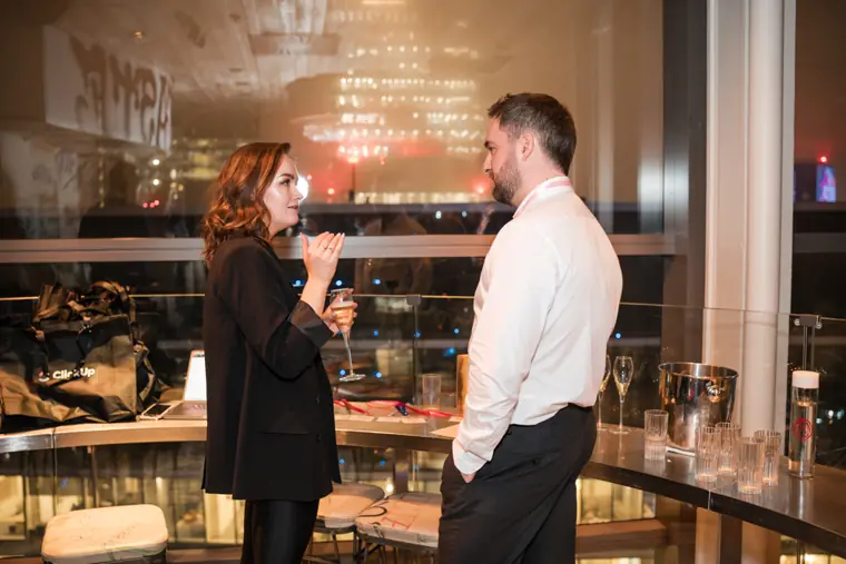 Guests connecting at the ClickUp evening reception.