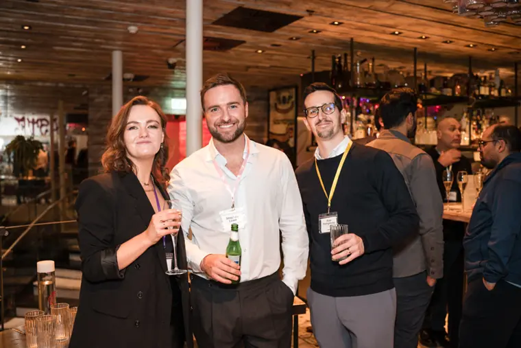 Guests connecting at the ClickUp evening reception.