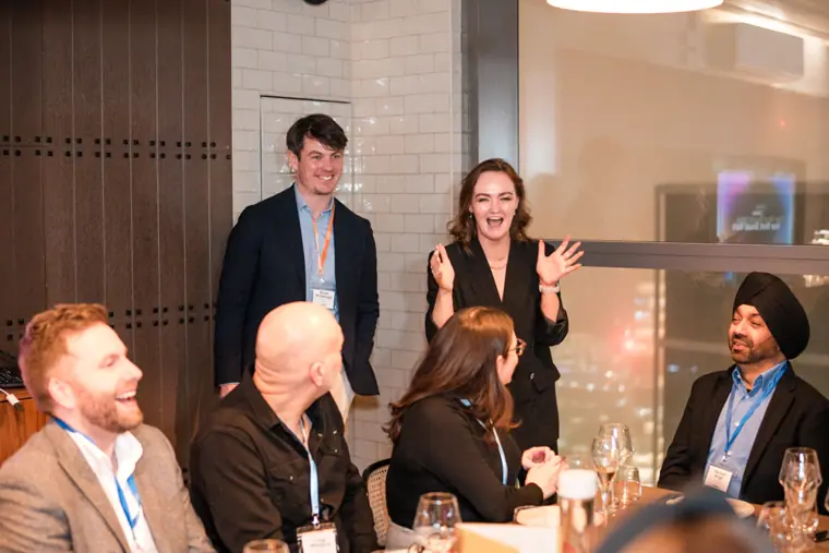 Guests and speakers at the ClickUp client dinner.
