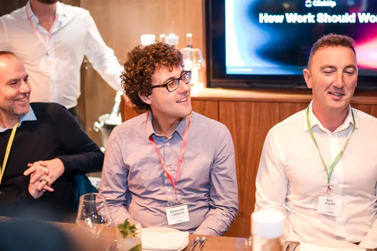Guests and speakers at the ClickUp client dinner.